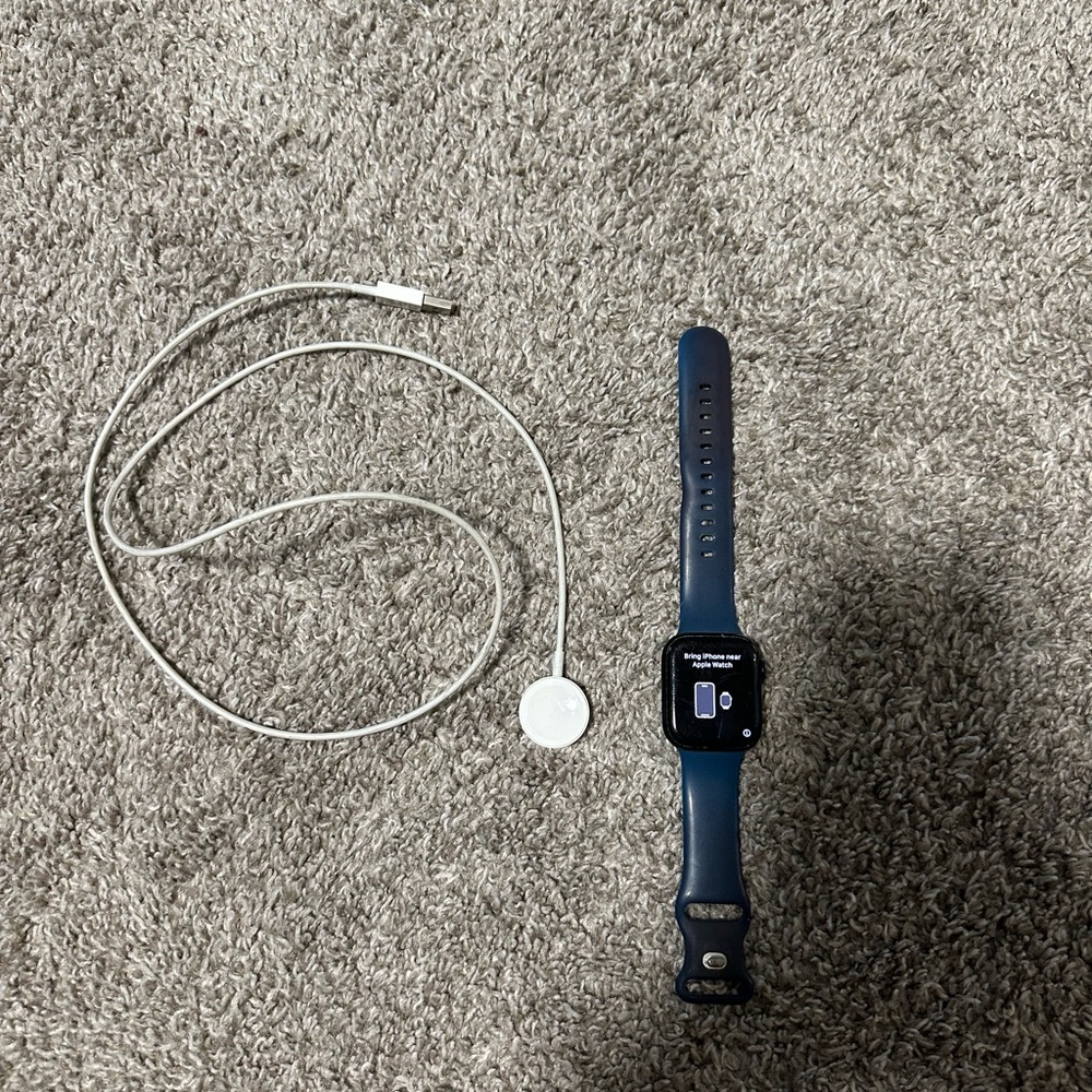 Apple Blue Smartwatch with White Charger